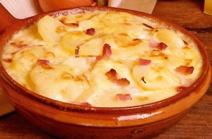 Tartiflette - a mouthwatering melange of gooey cheese, salty bacon, starchy potatoes and caramelised onions