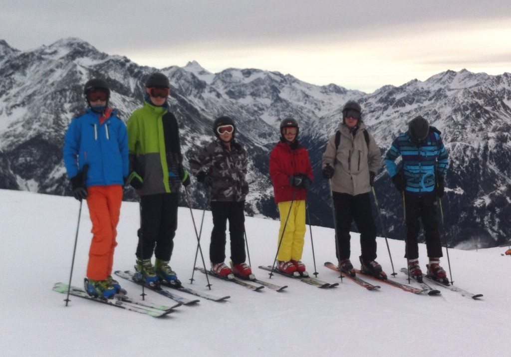 The Campkin family - skiing together but separated for dinner