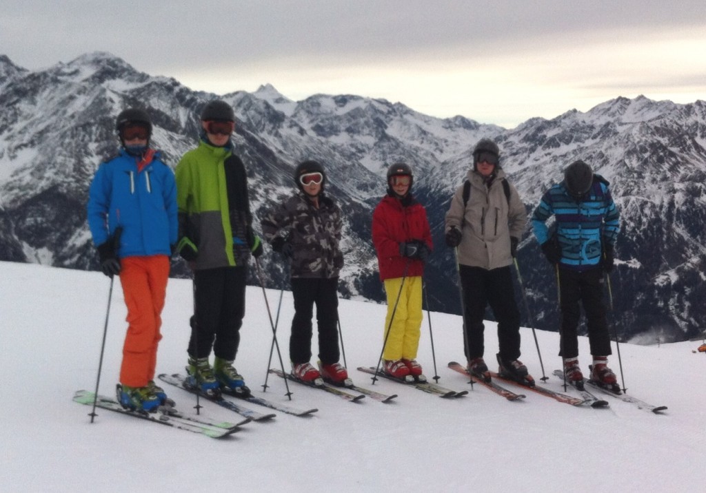 The Campkin family - skiing together but separated for dinner